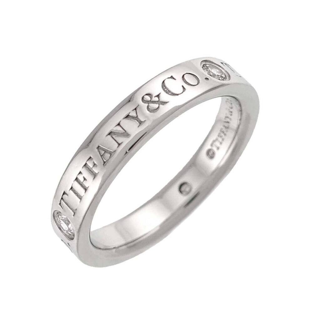 Tiffany & Co. Band Ring with 3 Diamonds, Platinum.
